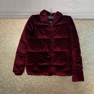 This a red velvet material puffer jacket form Old Navy.